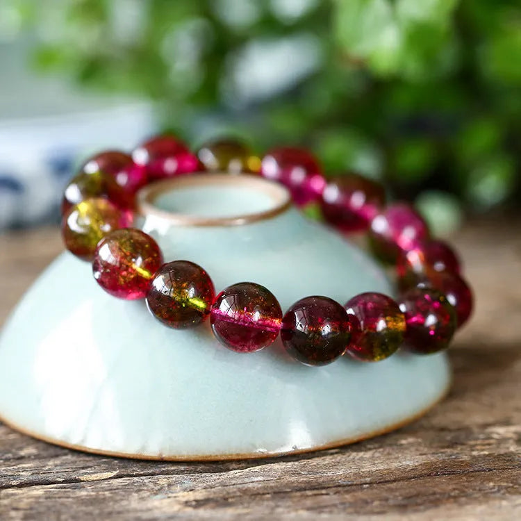 Handmade women's bracelet with pink and green watermelon crystal beads in casual pastoral style.