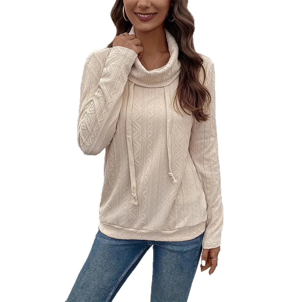 Apricot coloured long sleeve hooded pullover sweater with drawstring adjustment