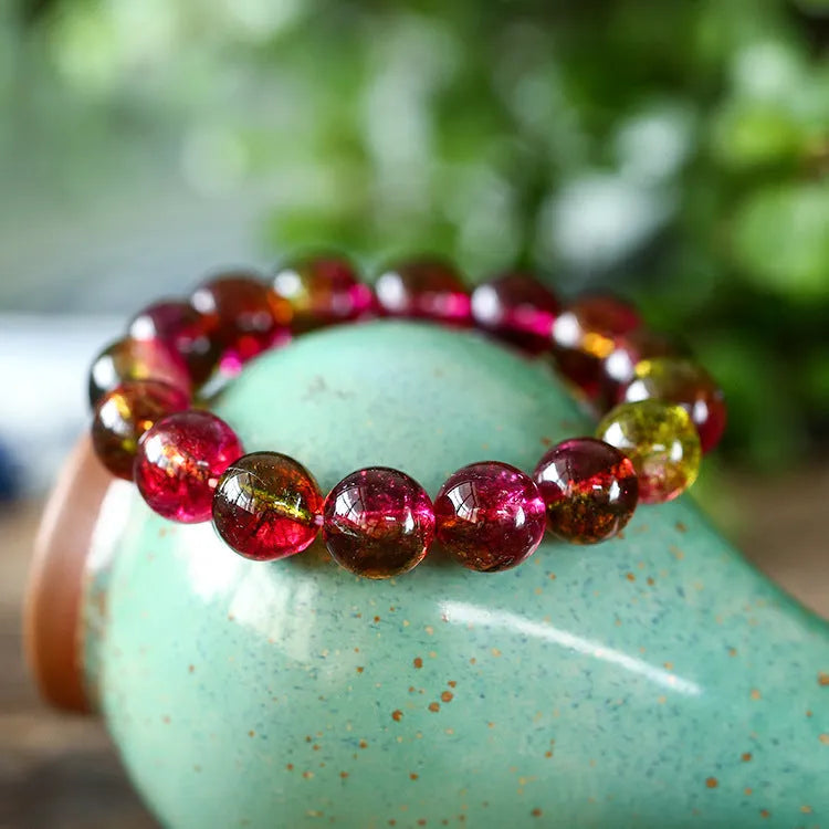 Handmade women's bracelet with pink and green watermelon crystal beads in casual pastoral style.