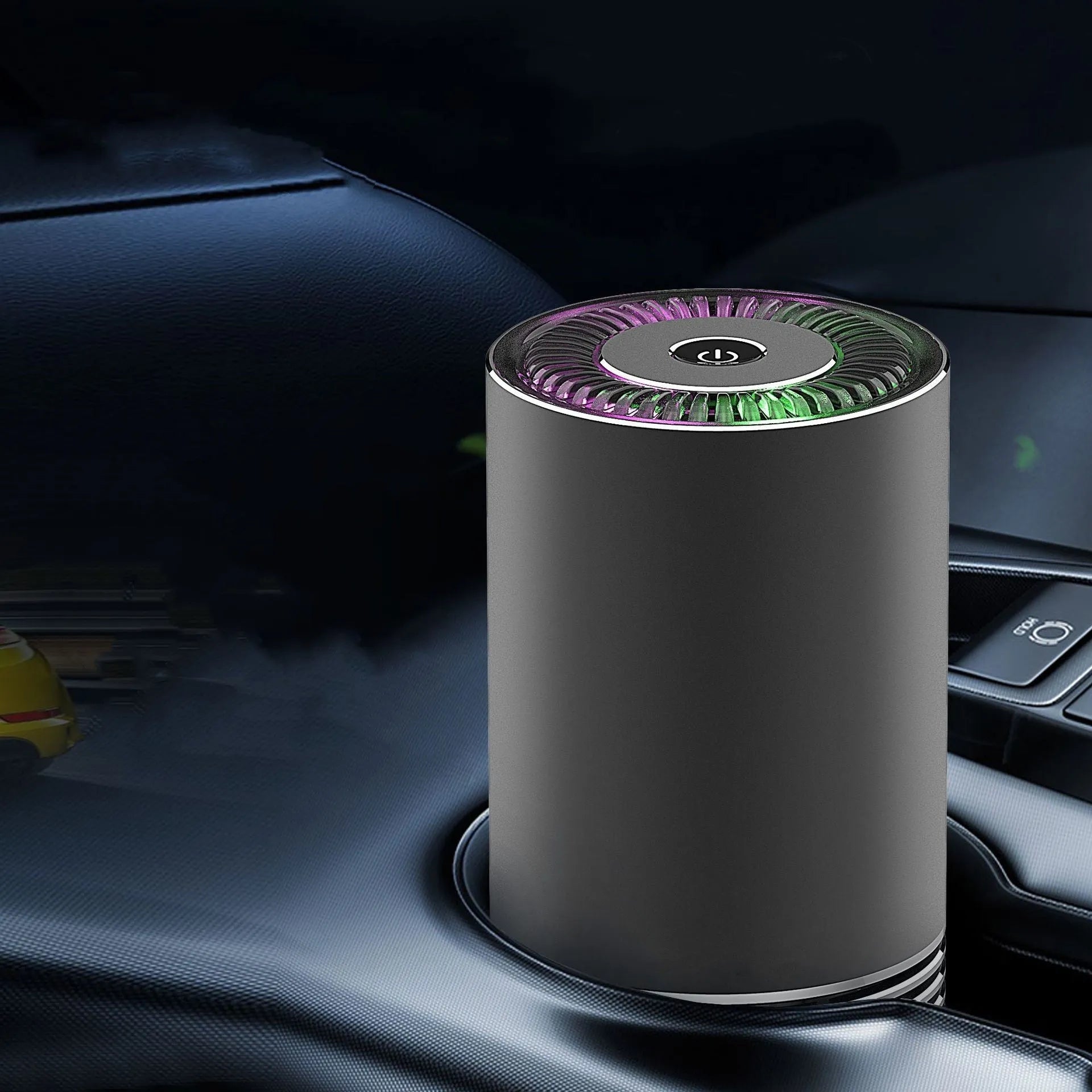 Compact metallic car air purifier on a dashboard with Black, Silver, and Grey colour options.
