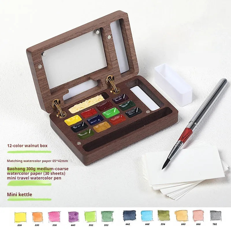 Mini walnut wood watercolour paint box with basic artist pigments and portable design