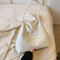 Retro style PU shoulder handbag with sandwich pocket and organised interior compartments