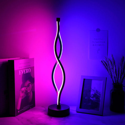Black aluminium desk lamp with touch and button dimming controls on a desk.