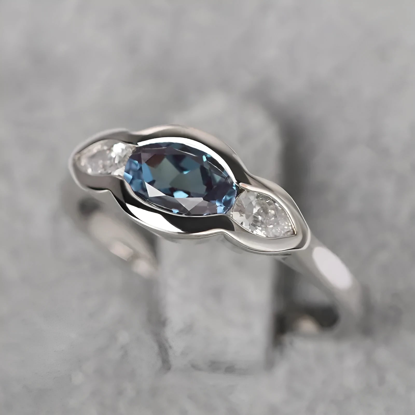 Women's geometric ellipse ring in white gold finish with inlaid zircon stones on copper