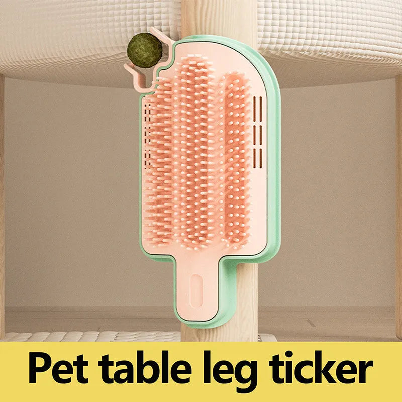 Ice cream cone shaped cat grooming toy with mint ball and feather attachment.