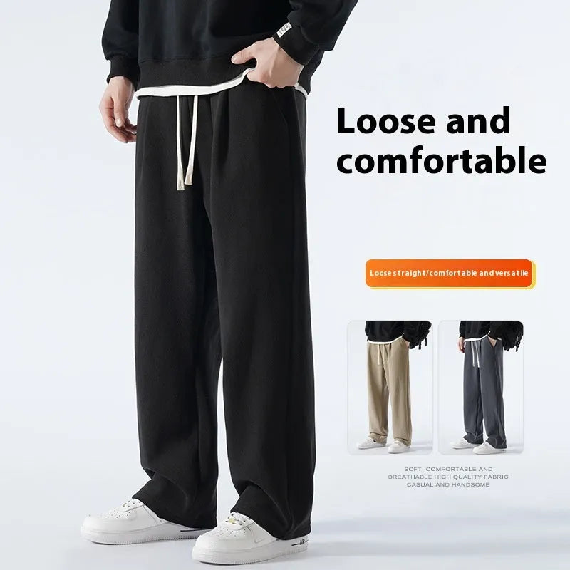 Men's apricot double-sided polar fleece casual trousers with a drawstring waistband, shown laid flat.
