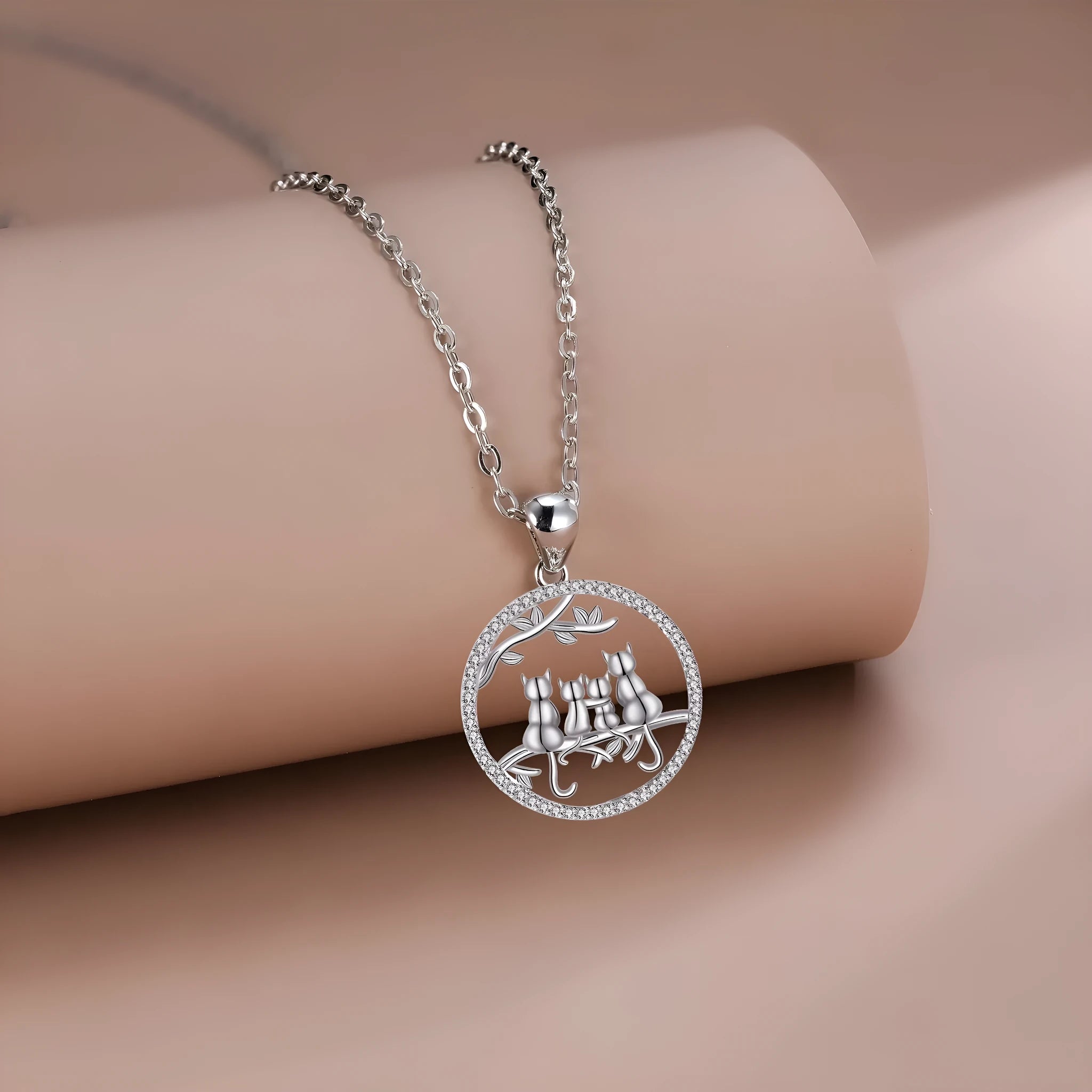 Copper necklace with four kitten pendant design and cross chain styling
