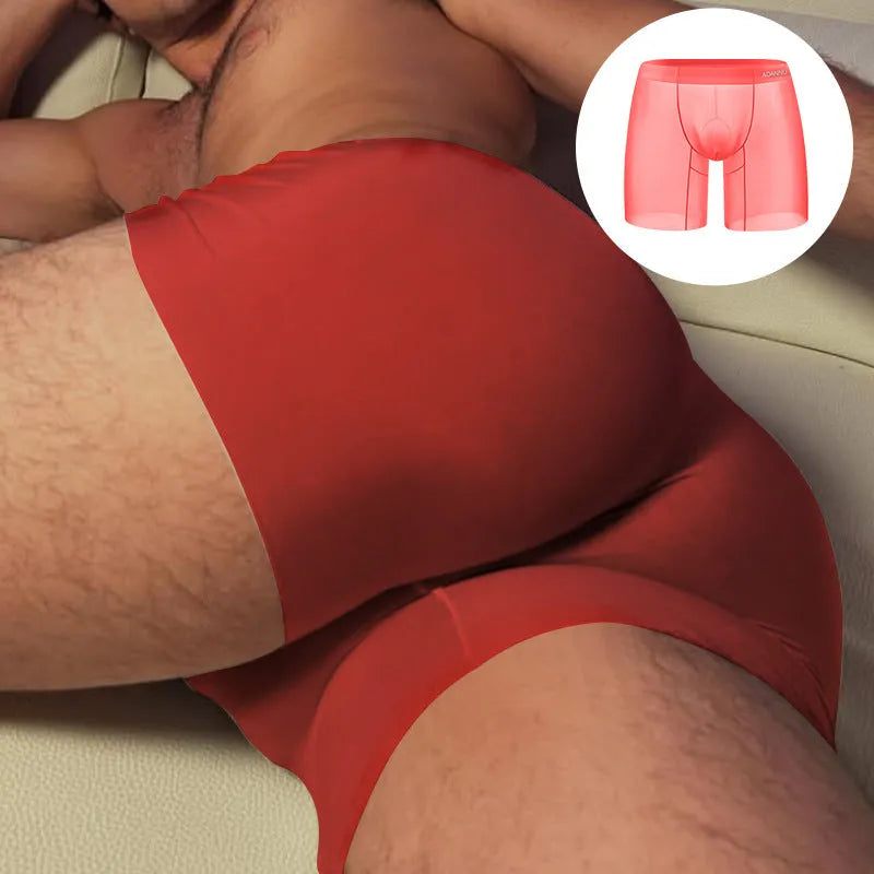 Seamless nylon sports boxer shorts for men in orange, pink, and red colours with low-waist hip-lifting design