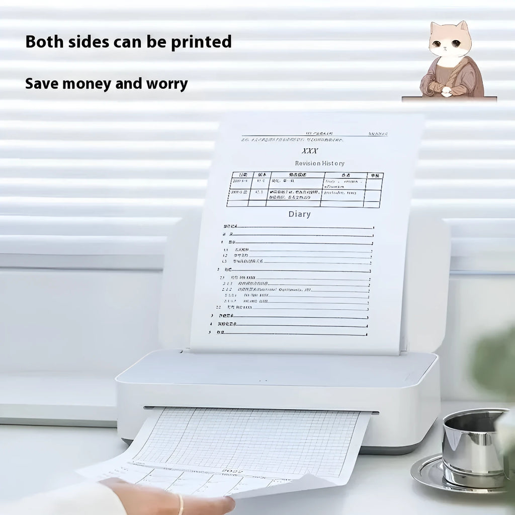 Small white plastic intelligent remote learning printer with thermal ribbon cartridge on a desk.