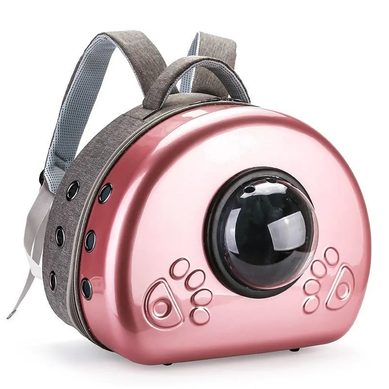 Transparent space capsule style pet carrier bag for cats in a metallic colour with a front shell cover.
