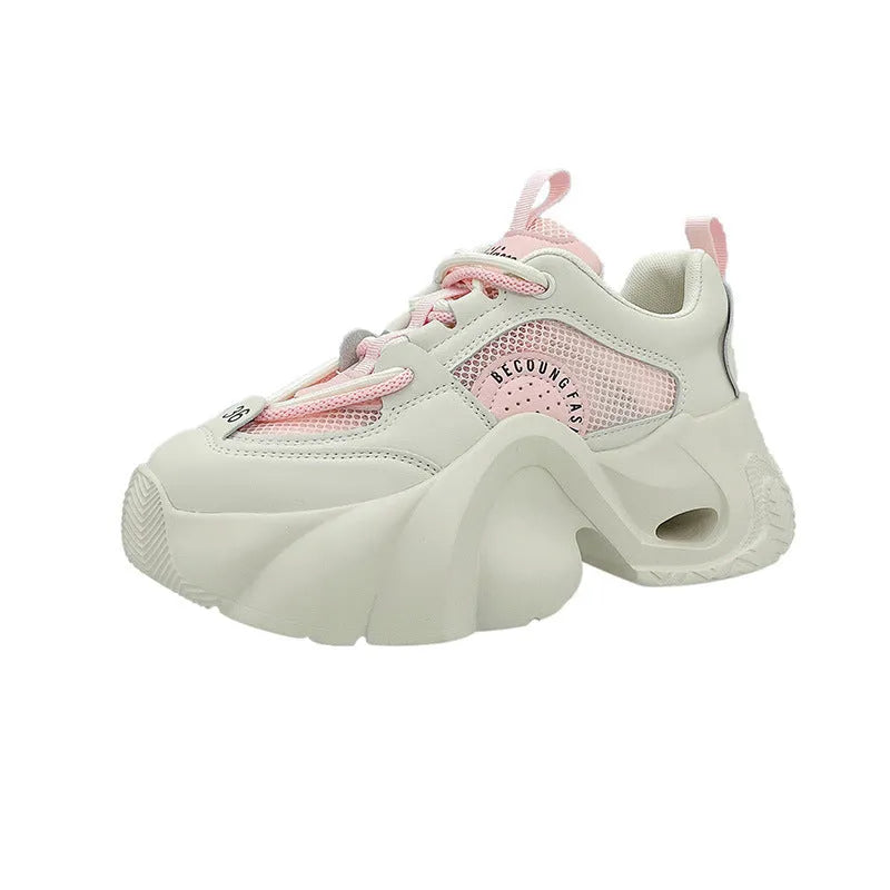 Women's pink casual sneakers with cross strap design and thick mid-heel sole