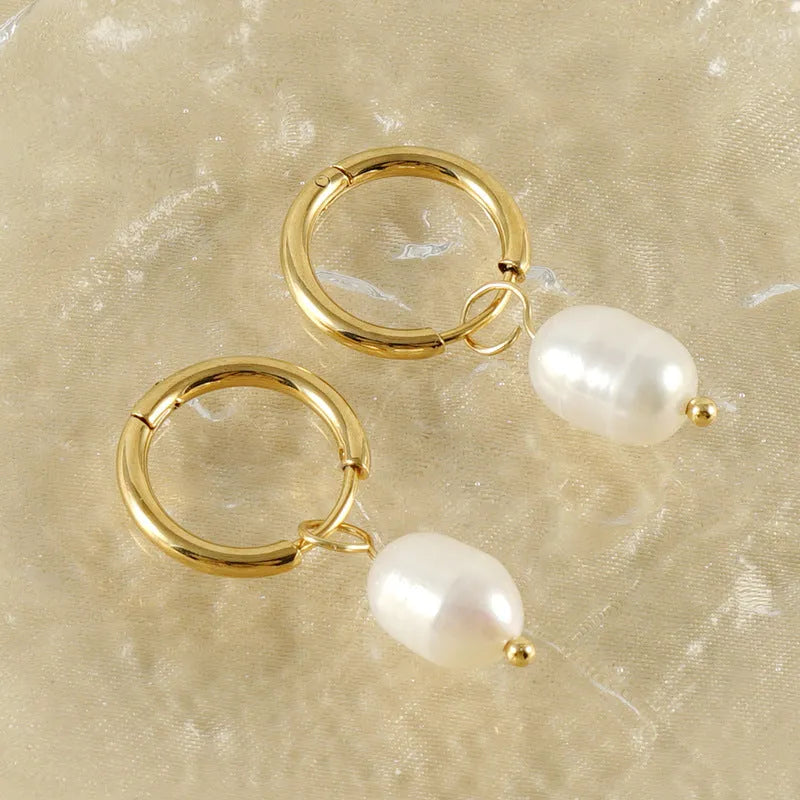 Geometric gold earrings with freshwater pearls on stainless steel posts