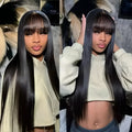 A woman wearing a natural colour human hair full lace wig with long, straight hair.
