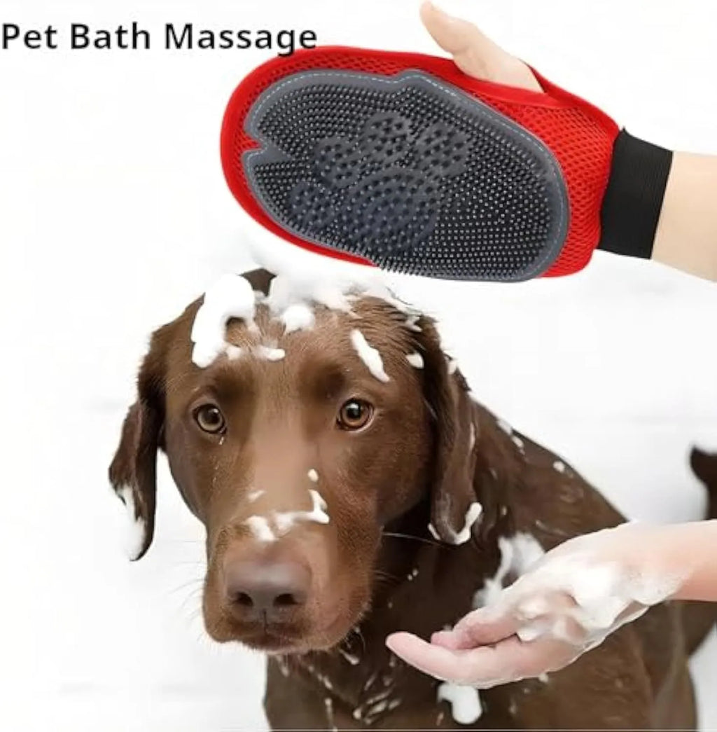 Red pet bathing glove with integrated cleaning brush showing adjustable design for left or right hand use