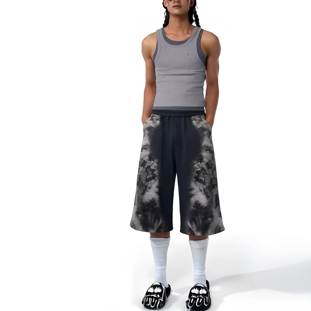 Printed loose fit trouser set including trousers, hoodie, and seven-inch shorts with collage stitching details