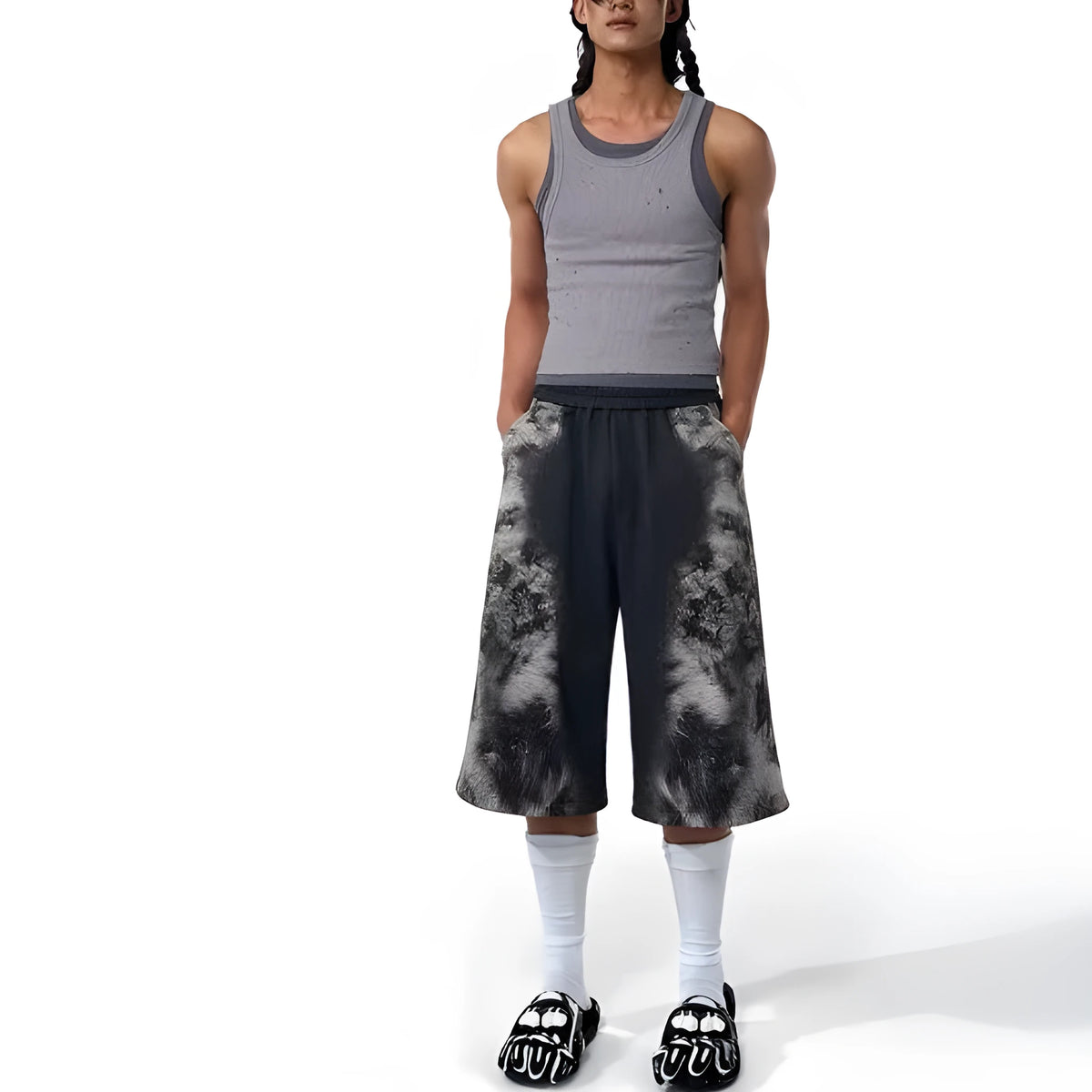 Printed loose fit trouser set including trousers, hoodie, and seven-inch shorts with collage stitching details
