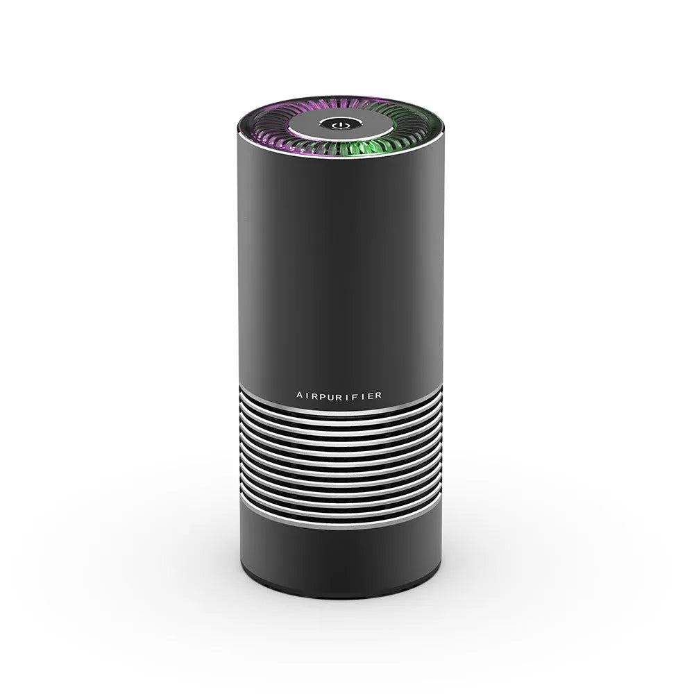 Compact metallic car air purifier on a dashboard with Black, Silver, and Grey colour options.