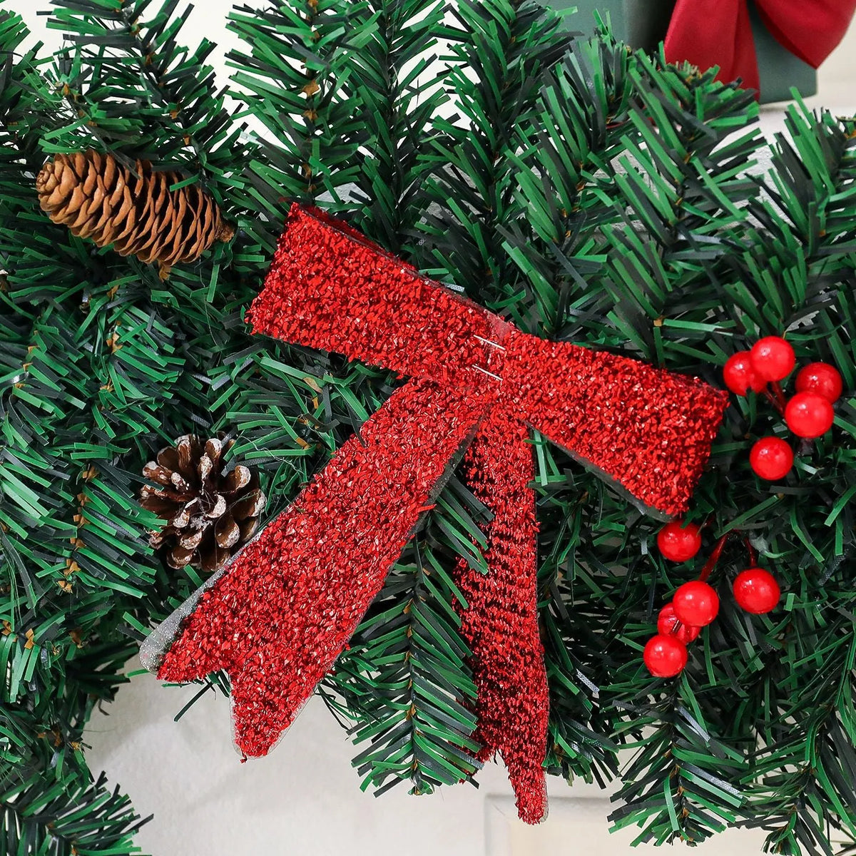 European-style Christmas rattan pine cone bow decoration with optional lighting on display surface