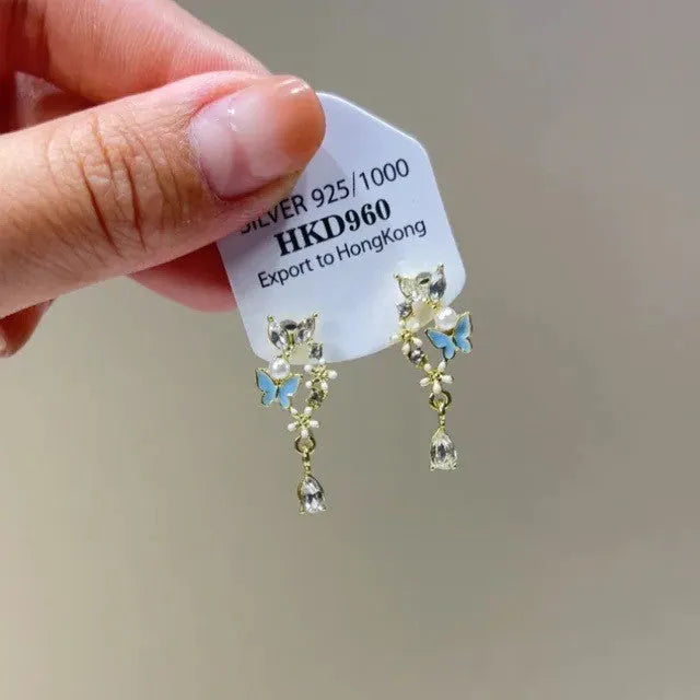 Geometric heart shape women's earrings with rhinestone star and tassel drop design in electroplated alloy