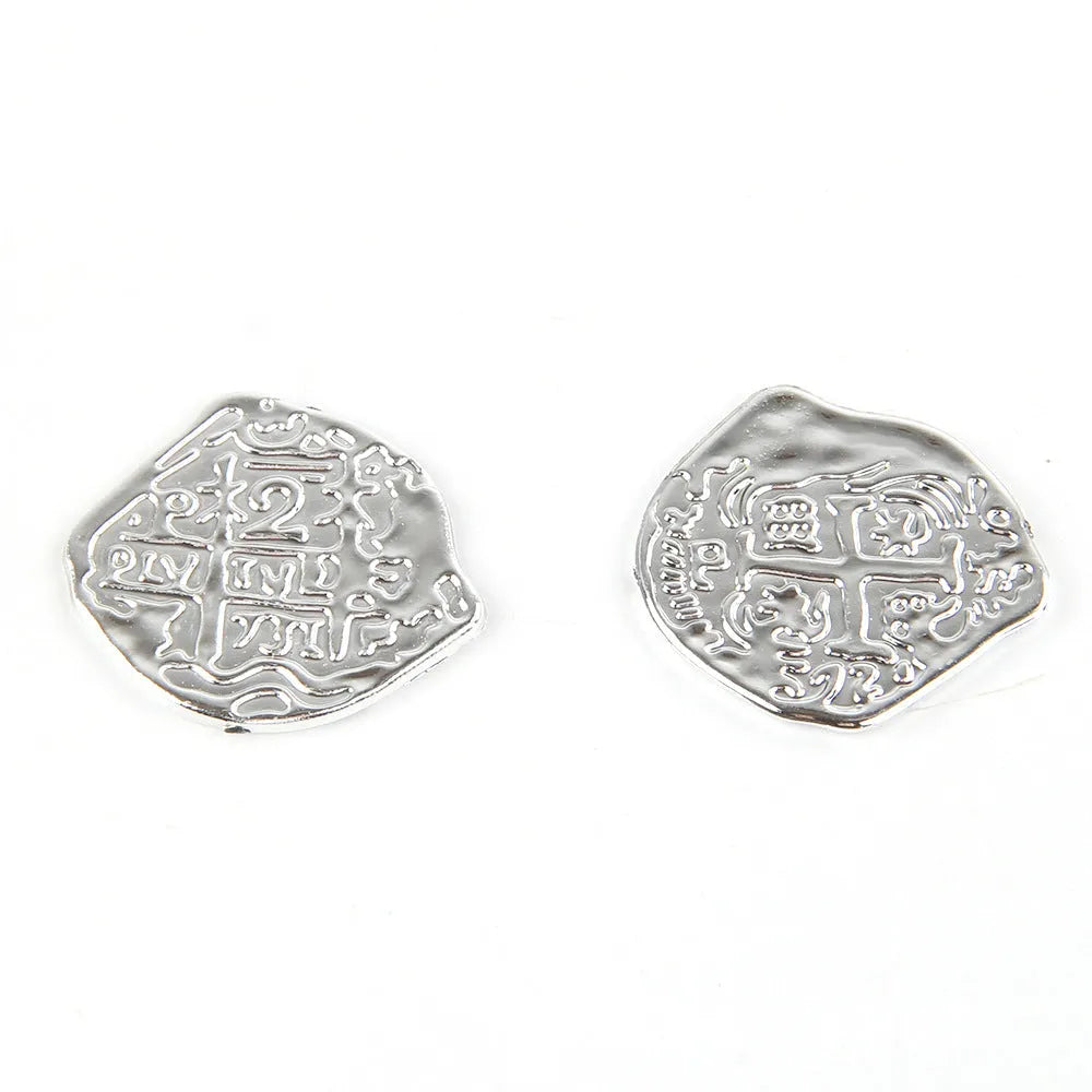Doli set of 100 electroplated plastic Roman coins in bronze, gold, or silver finish.