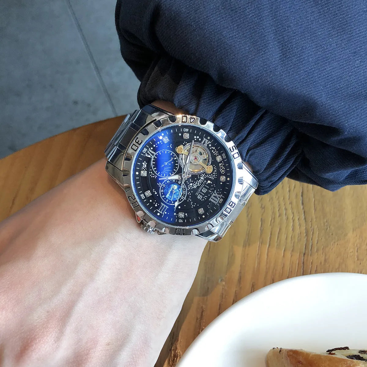 Men's automatic mechanical watch with starry dial, silver case, black genuine leather strap and transparent back