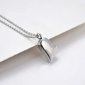 Curved peach heart stainless steel pendant necklace with silver electroplated finish