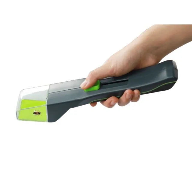 Green plastic handheld insect catcher for garden and lawn pest control.