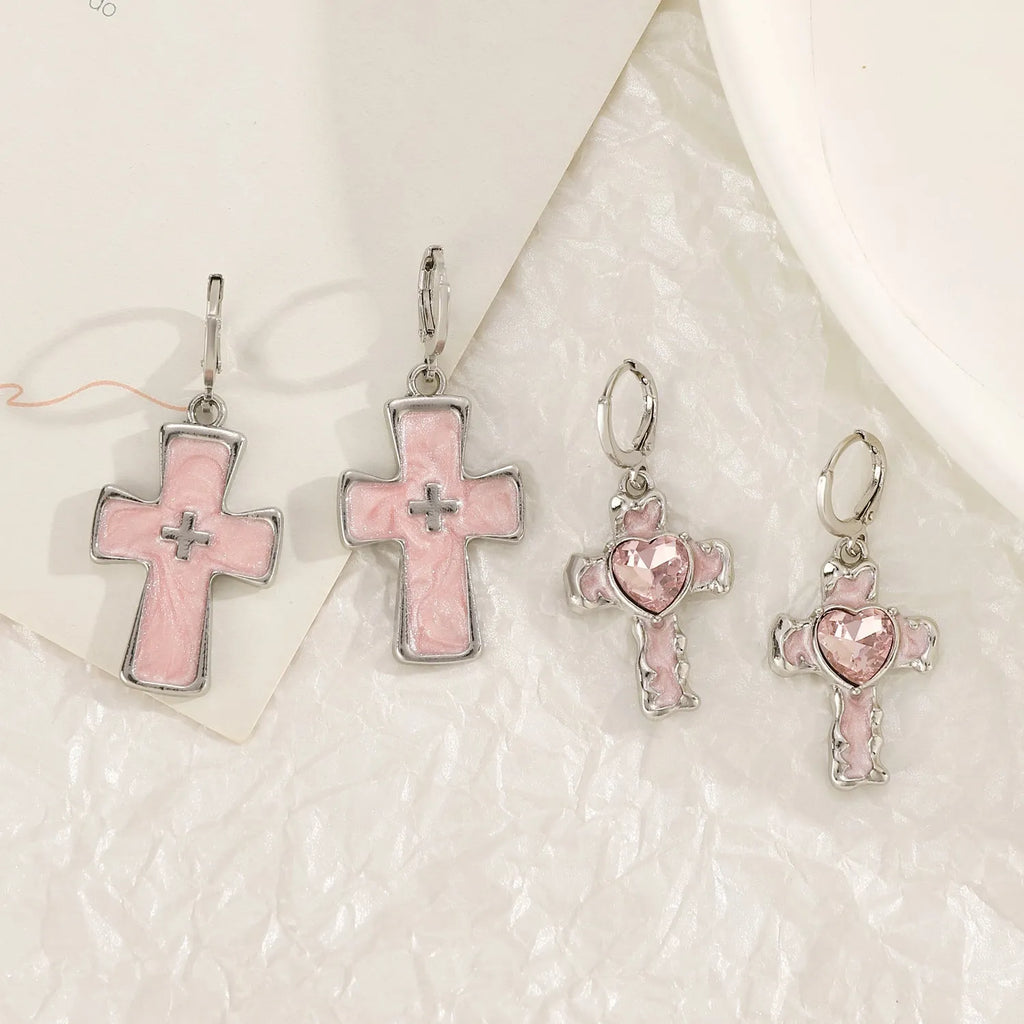 Women's cross crystal earrings with dripping oil treatment in white, black, and silver colour variations
