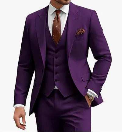 Man wearing a bright red slim fit three-piece suit with waistcoat, suitable for a wedding or business event.