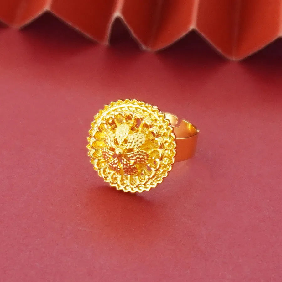 Gold-plated three-piece jewellery set with floral pendant necklace, matching ring and earrings