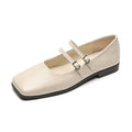 Women's silver genuine leather Mary Jane flats with a cross buckle strap and flat low heel.