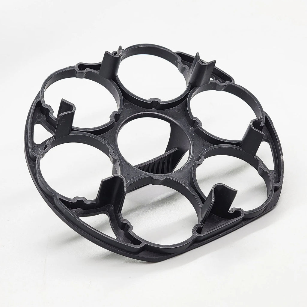 Black plastic egg holder rack with modern design for kitchen organisation.