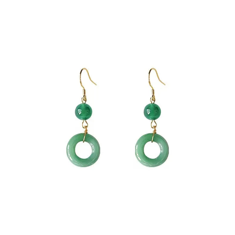 Green geometric peace buckle earrings with 14K gold plating on a zinc alloy base.