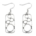 Geometric round ring earrings with irregular square shapes in antique silver finish