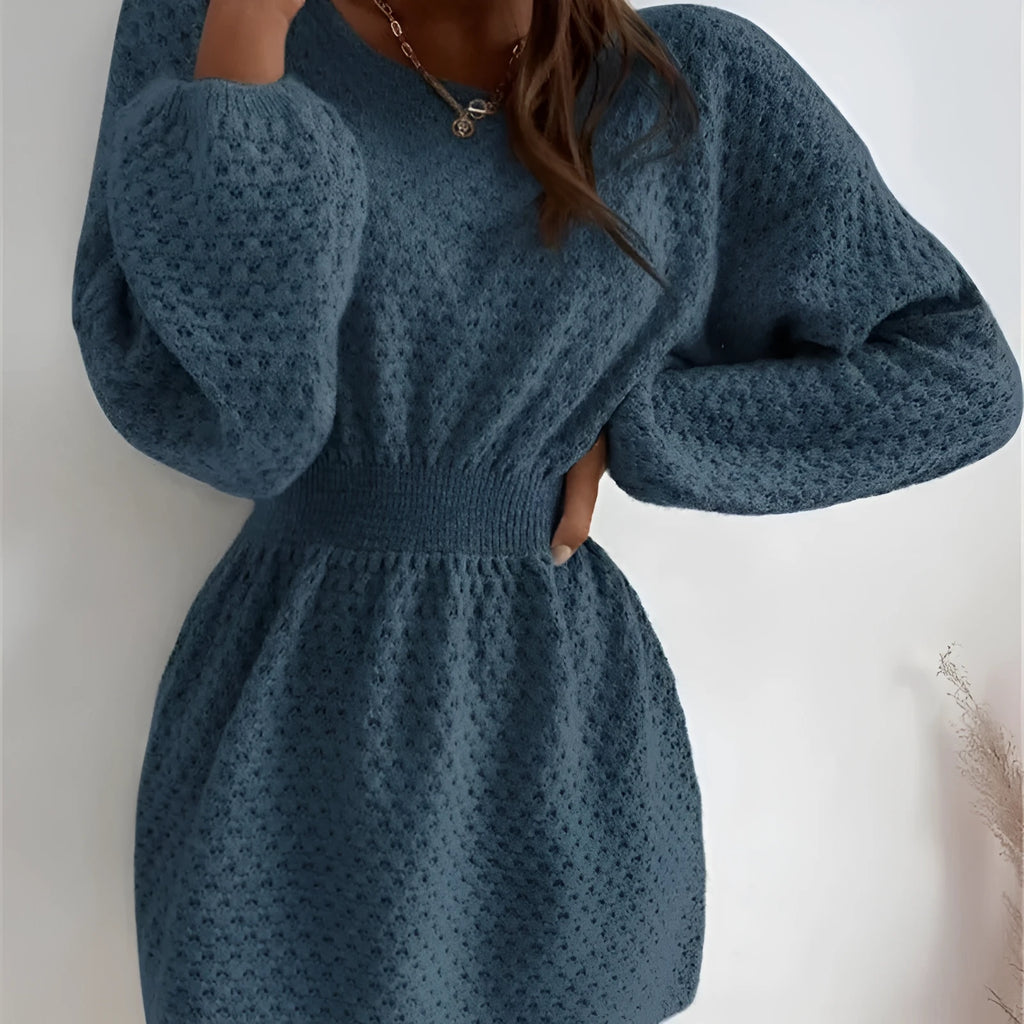 Blue women's knitted dress with hand-crocheted flowers and fitted waist