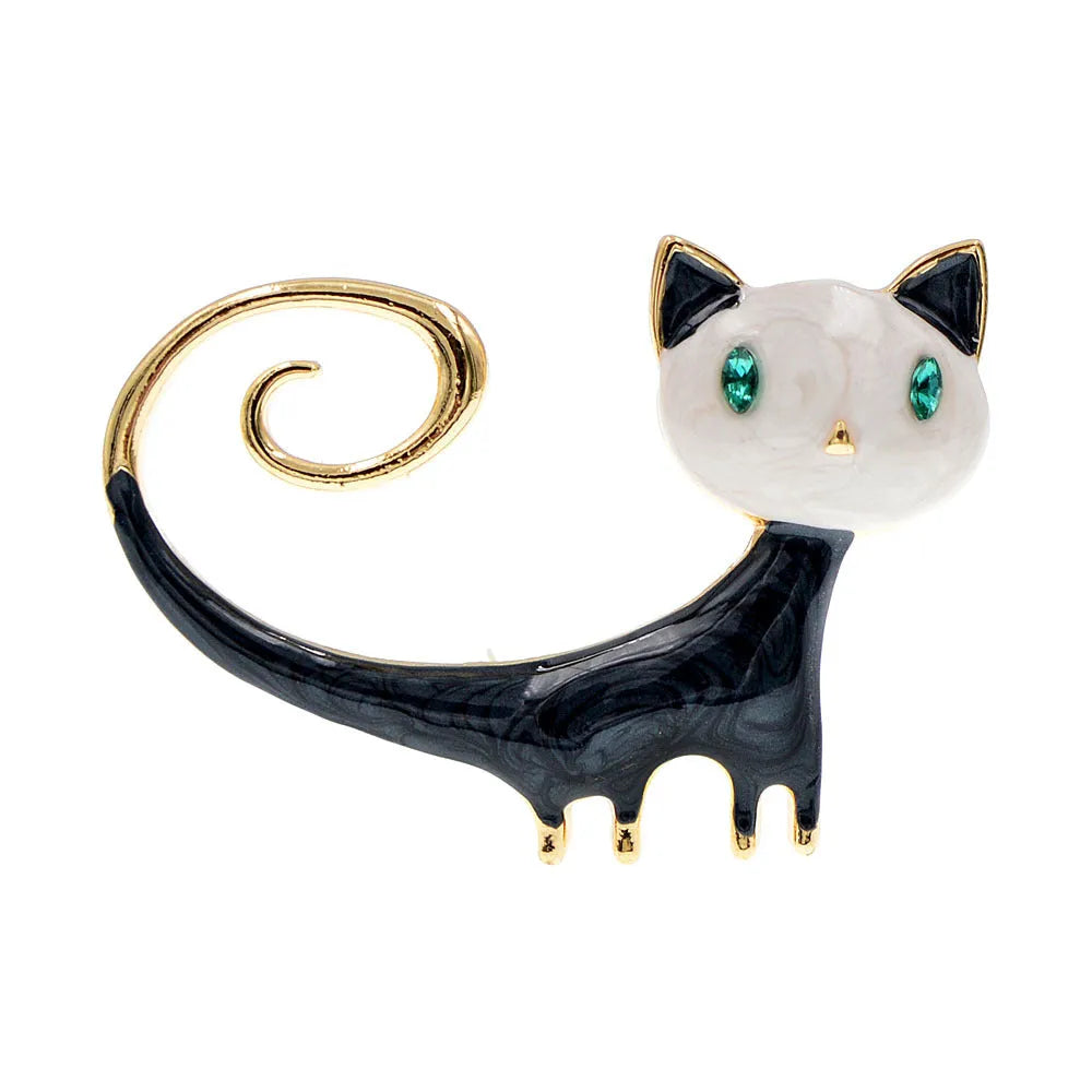 Close-up of a hand-painted tail-up kitten brooch in alloy metal, on a white background.