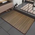 Square diatom ooze floor mat with geometric wood grain pattern in a shower room setting
