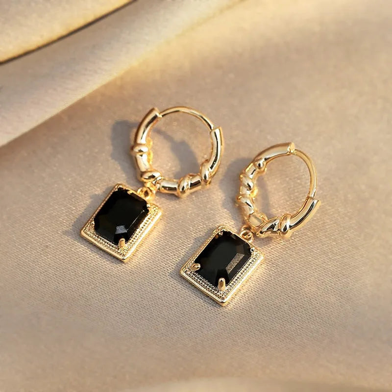Pair of black zircon and copper geometric quadrilateral earrings in retro French Court style.