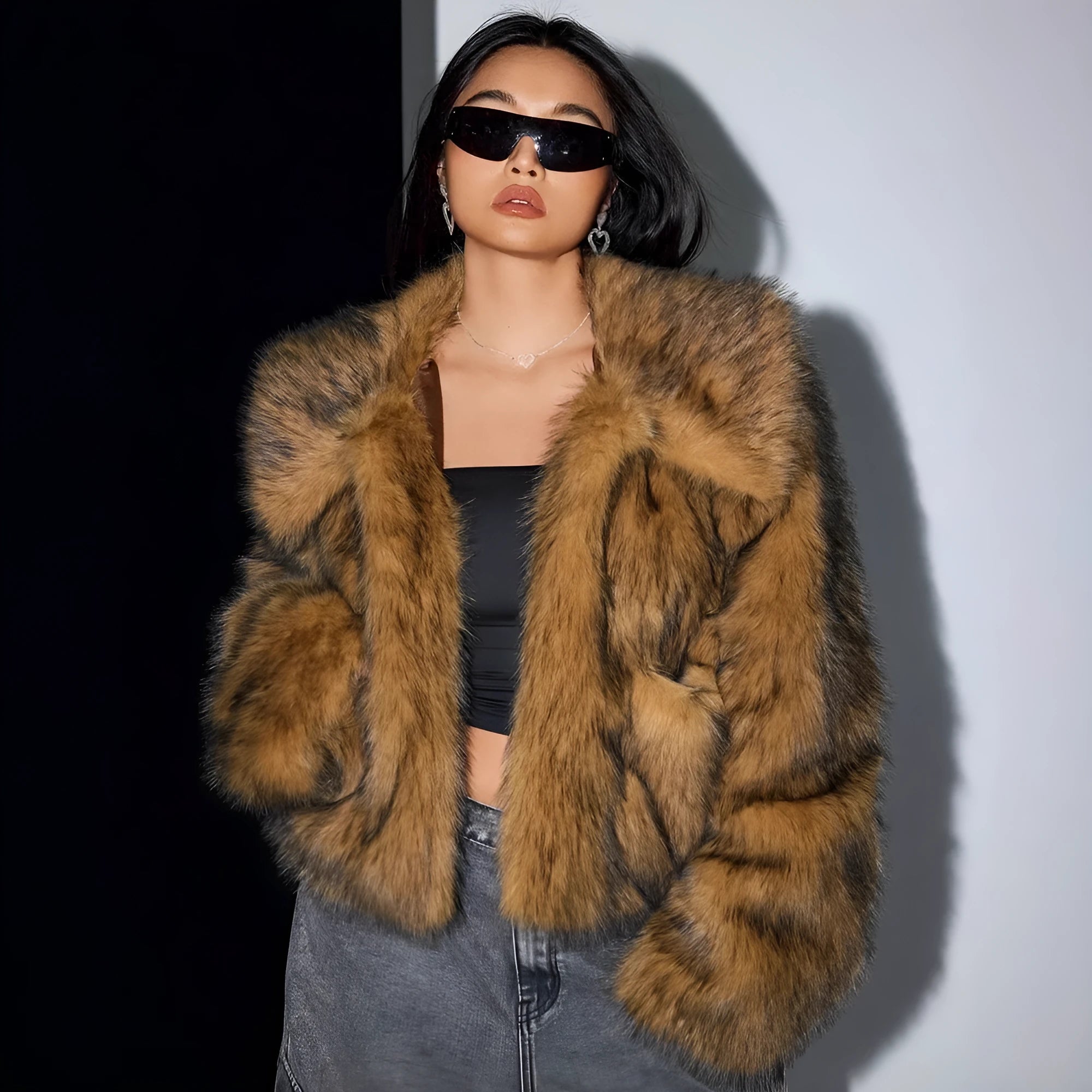 Black artificial fur coat with a large fur collar, shown in a short length style.