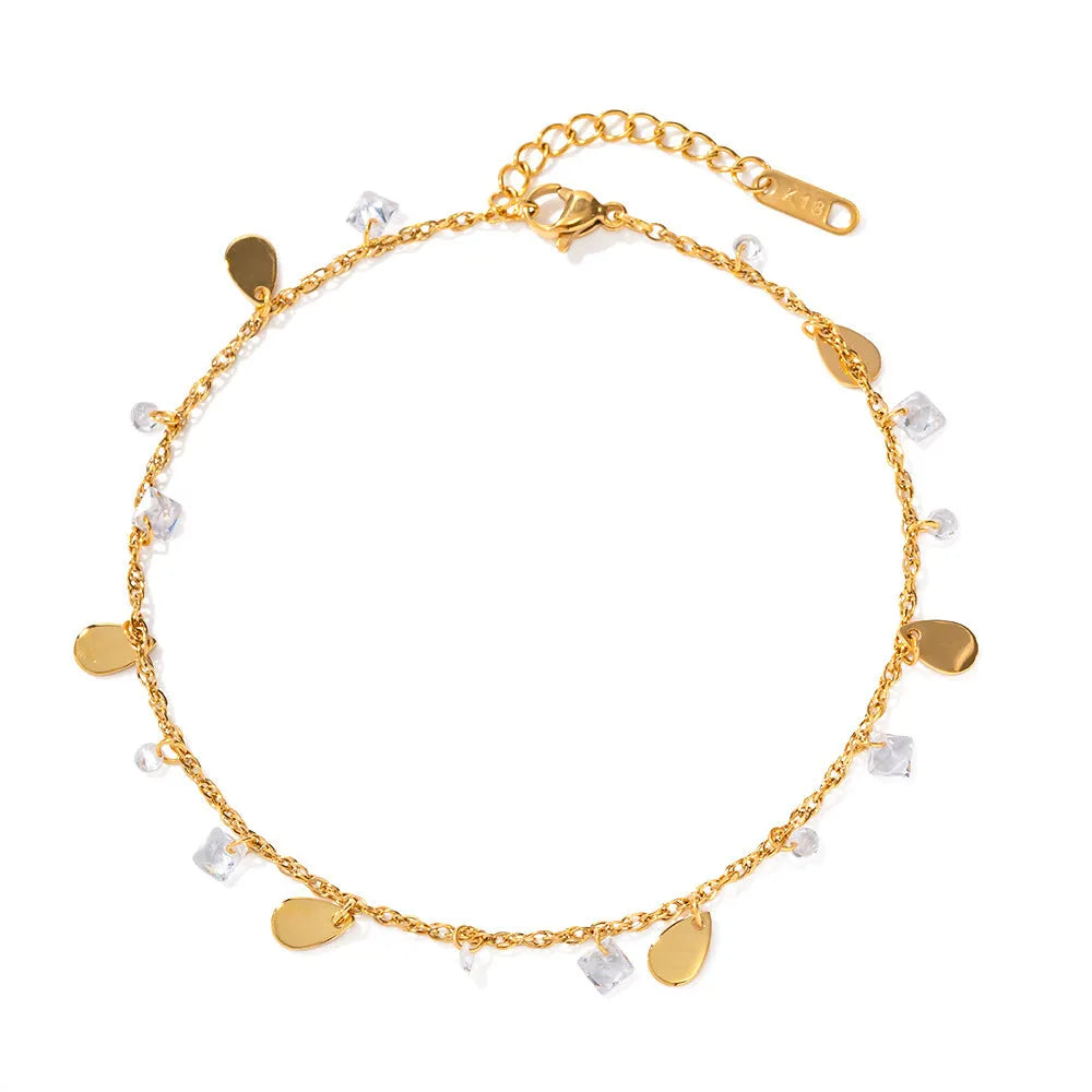 Women's stainless steel anklet with a geometric water drop pendant and a tassel detail.