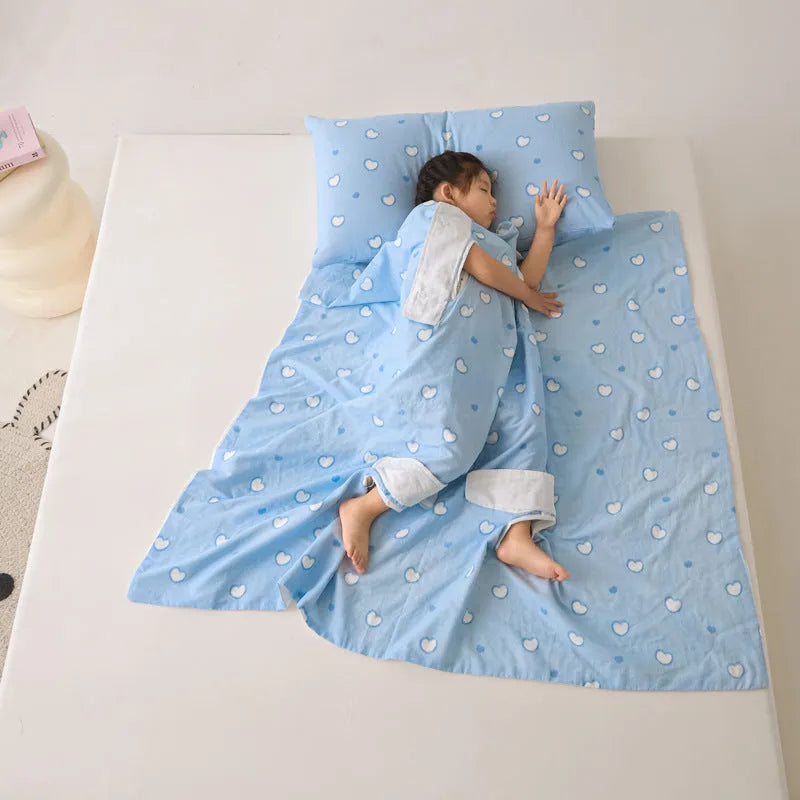 Colourful patterned anti-kick sleeping bag blanket folded to show size and design.