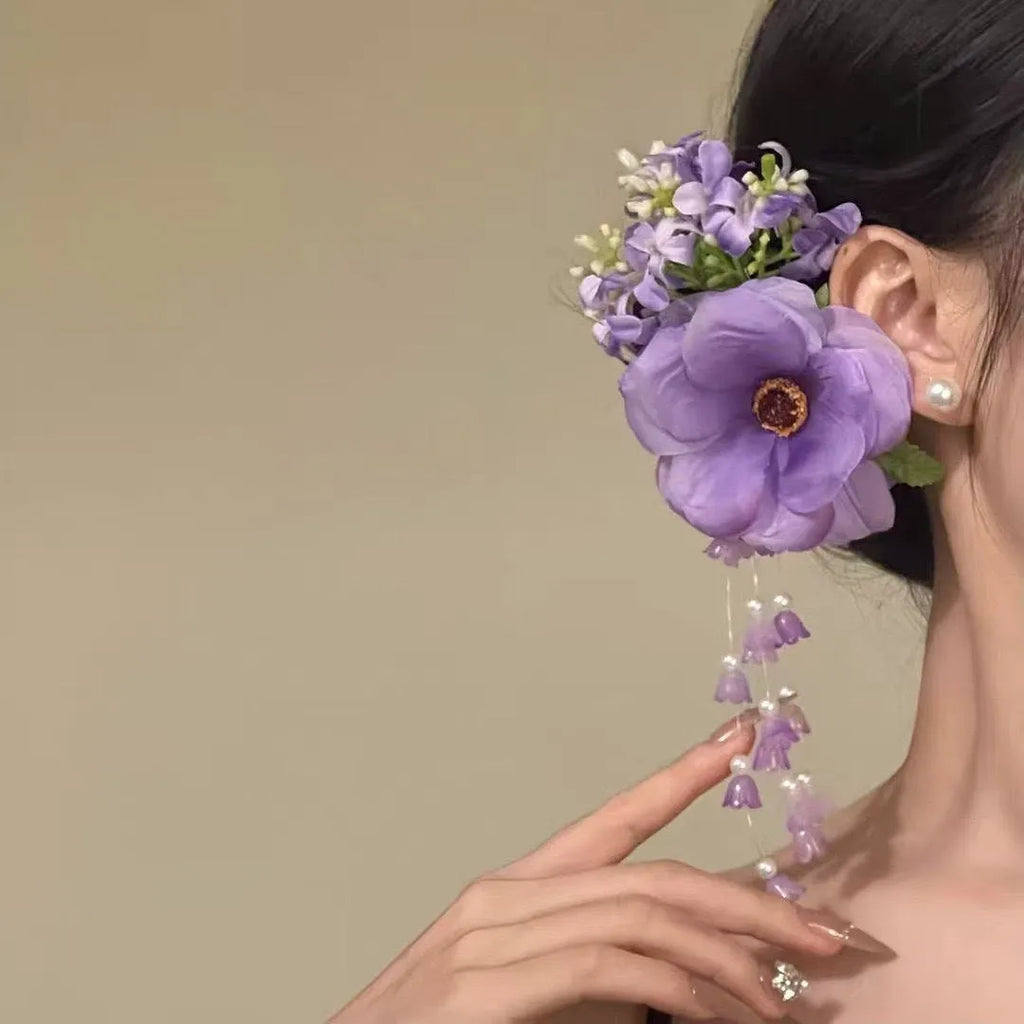 Yellow flower tassel side hair clip with manual craft details on white background