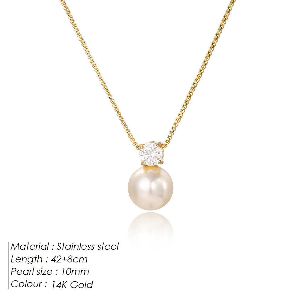 Gold and steel colour women's necklace with imitation pearl and zircon pendant on a stainless steel box chain.
