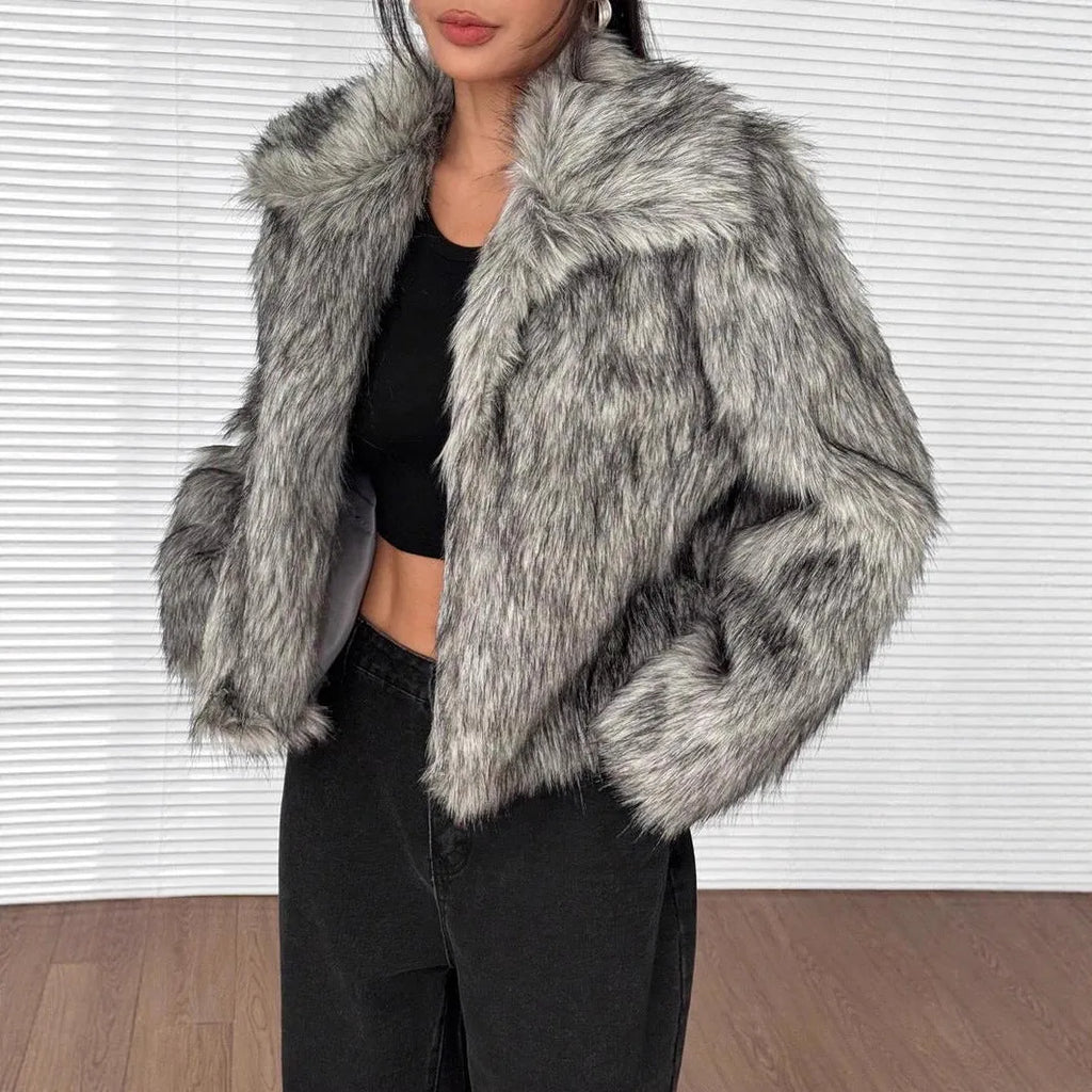 Black artificial fur coat with a large fur collar, shown in a short length style.