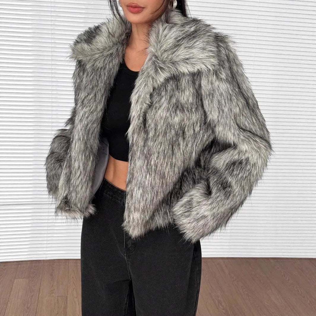 Black artificial fur coat with a large fur collar, shown in a short length style.