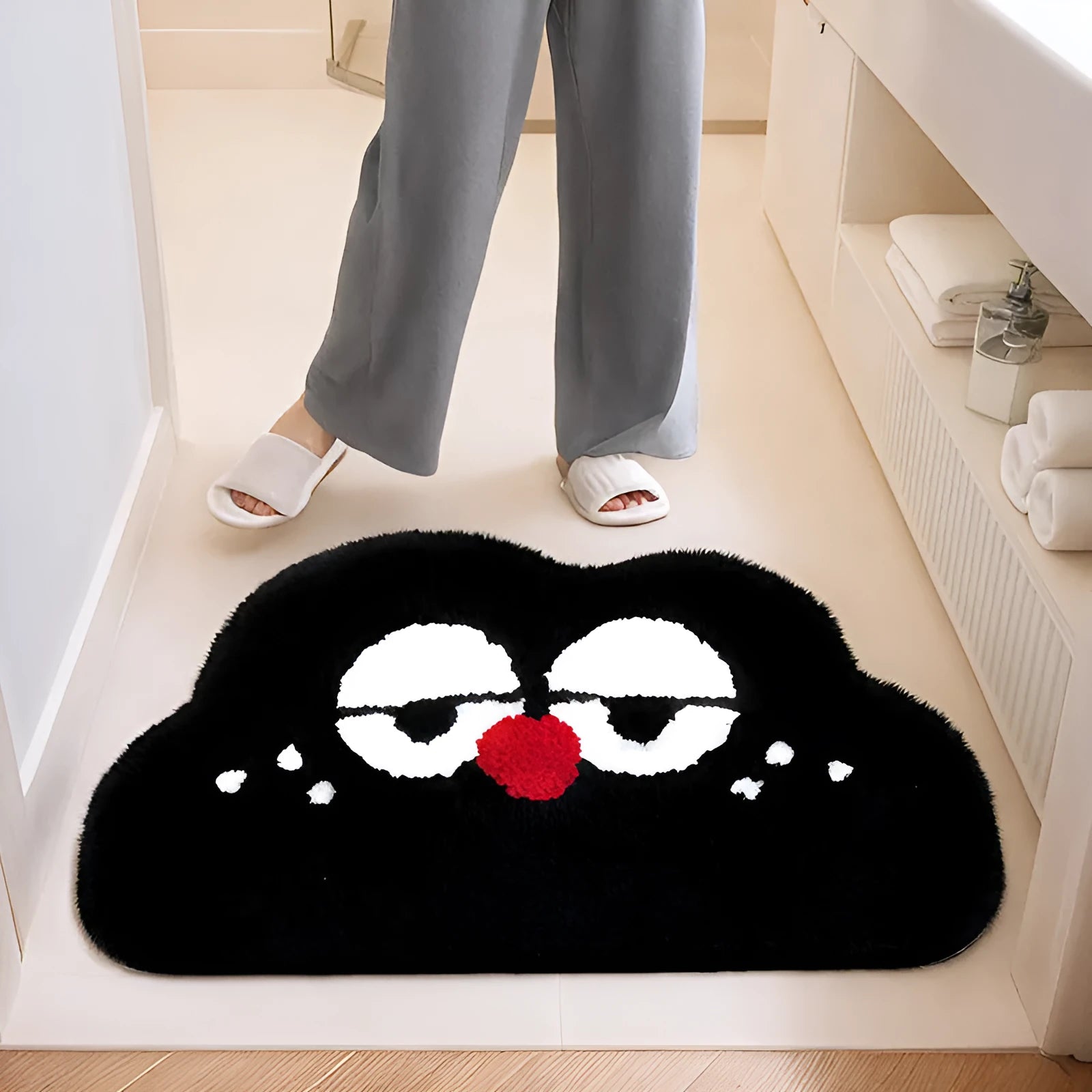 Cartoon anime print bathroom mat with cashmere-like texture on a tiled floor