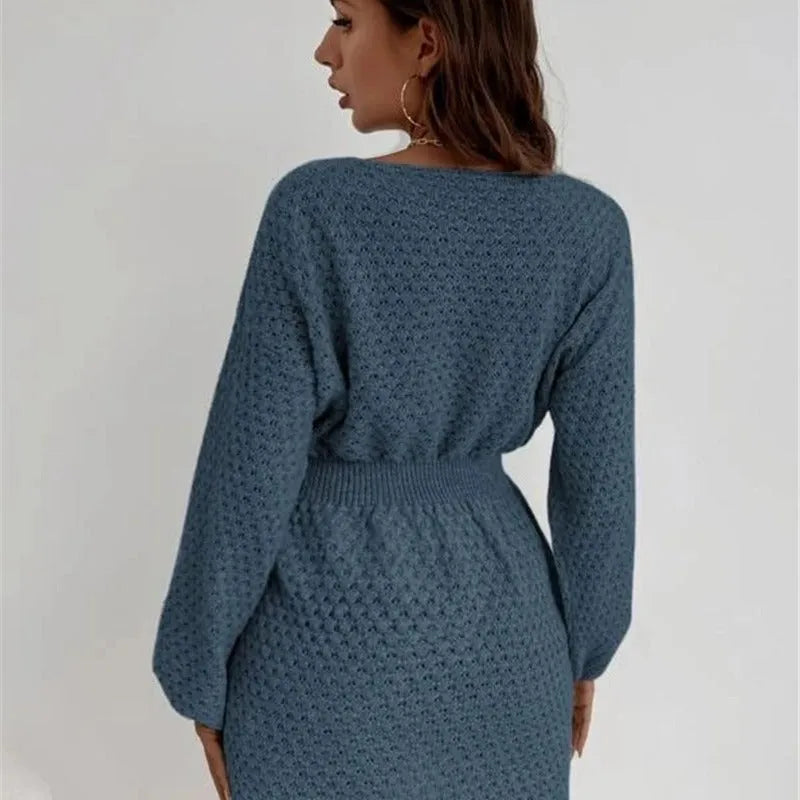 Blue women's knitted dress with hand-crocheted flowers and fitted waist