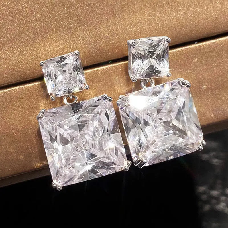 Geometric square copper earrings with quadrilateral design in white gold and gold colour finishes