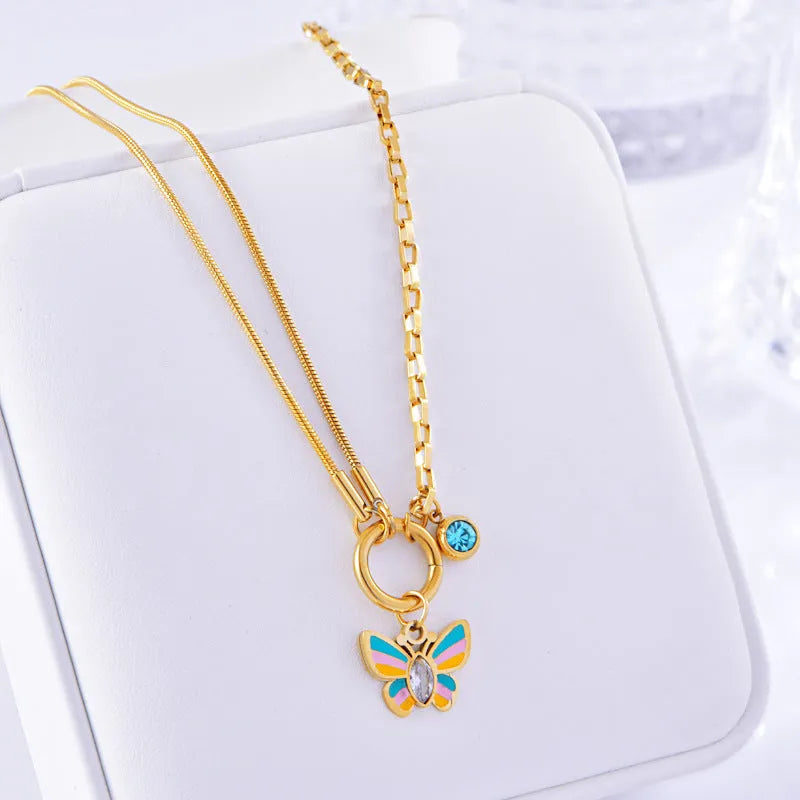 Gold titanium steel epoxy butterfly necklace and bracelet set with snake bones chain.