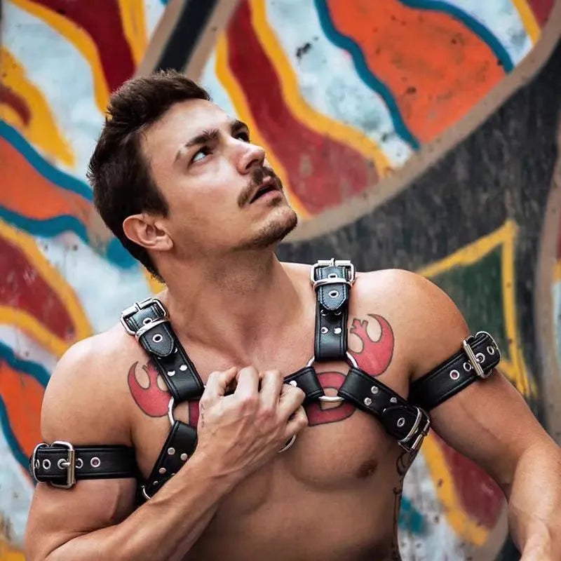 Black leather chest bondage strap with metal buckle adjustment for adult muscle harness